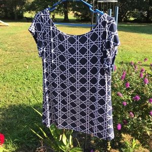 Tart geometric blue and white top.